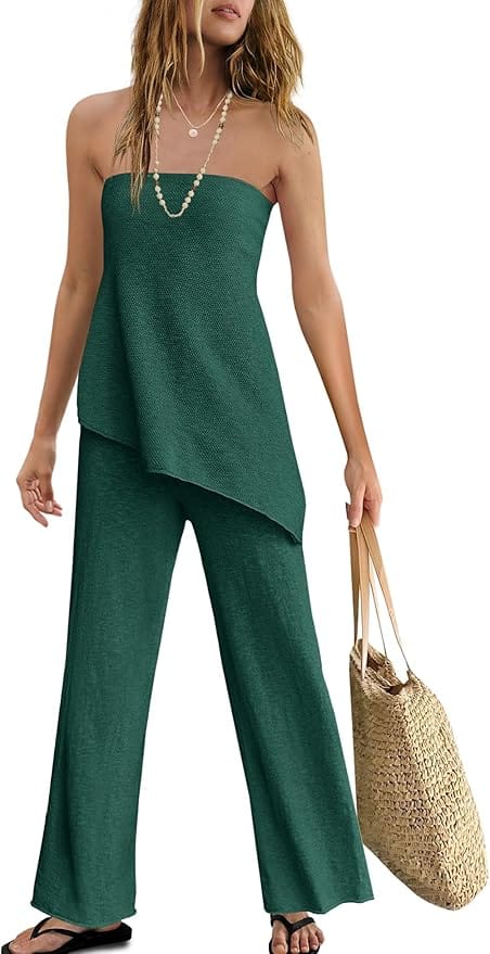 Woman wearing a green strapless two-piece lounge set with asymmetric top and wide-leg pants—perfect for summer vacations and beach days.