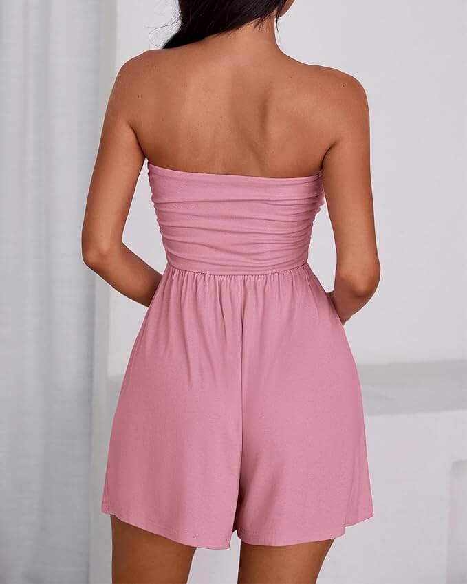 Lightweight pink tube romper with ruched top and flowy shorts, a flattering Amazon summer fashion find under $50.